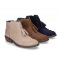 Ankle boots with tassels in suede leather combined with metal suede leather.