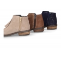 Ankle boots with tassels in suede leather combined with metal suede leather.