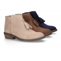 Ankle boots with tassels in suede leather combined with metal suede leather.