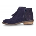 Ankle boots with tassels in suede leather combined with metal suede leather.