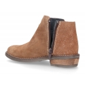 Ankle boots with tassels in suede leather combined with metal suede leather.