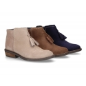 Ankle boots with tassels in suede leather combined with metal suede leather.