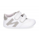 Tennis style shoes for babies with hook and loop strap in soft leather combined with patent leather.