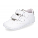 Tennis style shoes for babies with hook and loop strap in soft leather combined with patent leather.