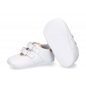 Tennis style shoes for babies with hook and loop strap in soft leather combined with patent leather.