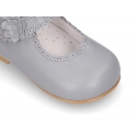 Classic Little Mary Janes with hook and loop strap with flower in pearl nappa leather.