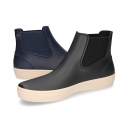 Ankle rain boots with elastic band and SNEAKER DESIGN.