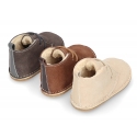 Little Safari boots for babies with ties closure and wool knit lining.