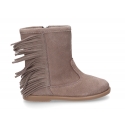 Suede leather boot shoes with fringed design.