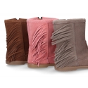 Suede leather boot shoes with fringed design.