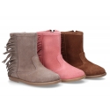 Suede leather boot shoes with fringed design.