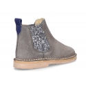 Kids suede leather ankle boots with elastic band with MELANGE GLITTER design.