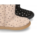 Suede leather boot shoes with STARS design and fake hair lining.