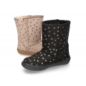 Suede leather boot shoes with STARS design and fake hair lining.