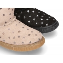 Suede leather boot shoes with STARS design and fake hair lining.