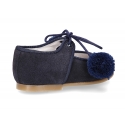 Suede leather little classic Mary jane shoes with POMPONS ties closure.