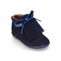 Classic suede leather little bootie with fringed design.