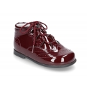 Patent leather classic english style bootie for first steps.