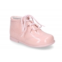 Classic patent leather English style bootie for first steps in pastel colors.