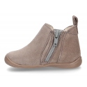 Suede leather little ankle boots with zipper, toe cap and counter for first steps.