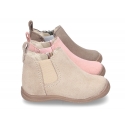 Suede leather little ankle boots with zipper, toe cap and counter for first steps.