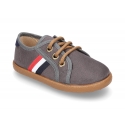 Autumn winter canvas tennis style shoes with flag detail.