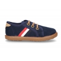 Autumn winter canvas tennis style shoes with flag detail.