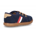 Autumn winter canvas tennis style shoes with flag detail.