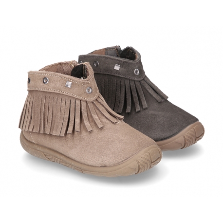 Suede leather ankle boots with FRINGED design and toe cap.