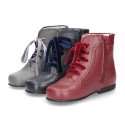 Classic Nappa leather Pascuala style ankle boots with waves in dark colors.