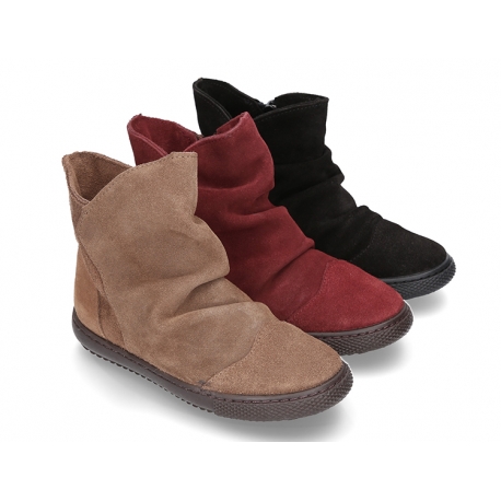 Suede leather girl boot shoes to dress with zipper closure.