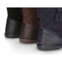 Washable leather boots combined with padded suede leather with tassels design.