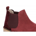 Ankle boots in suede leather with velvet counter in large sizes.