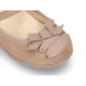 Autumn-winter canvas Mary Jane shoes with bow with crossed ribbons.