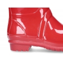 Classic SHINY rain boots with buckle design for kids.