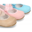 Soft suede leather little Mary Jane shoes with hook and loop strap and ribbon.
