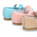 Soft suede leather little Mary Jane shoes with hook and loop strap and ribbon.