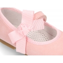 Soft suede leather little Mary Jane shoes with hook and loop strap and ribbon.