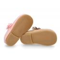 Soft suede leather little Mary Jane shoes with hook and loop strap and ribbon.