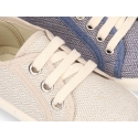New cotton canvas tennis shoes with spike design.