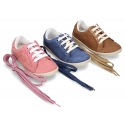 New Casual suede leather Tennis shoes with shoelaces closure.