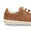 New Casual suede leather Tennis shoes with shoelaces closure.