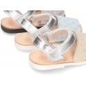 Menorquina sandals with hook and loop strap in suede leather with shiny effects.