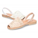 New Menorquina sandals with rear strap in pearl nappa leather with laces design.