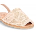 New Menorquina sandals with rear strap in pearl nappa leather with laces design.