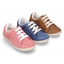 New Casual suede leather Tennis shoes with shoelaces closure.