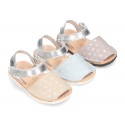 Menorquina sandals with hook and loop strap in suede leather with shiny effects.