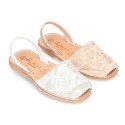 New Menorquina sandals with rear strap in pearl nappa leather with laces design.