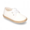 Special CEREMONY laces up shoes espadrille style with ties closure.