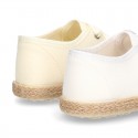 Special CEREMONY laces up shoes espadrille style with ties closure.